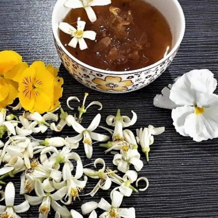 مربای بهار نارنج باعسل وزغفران پخته شده دربسته بندی کوچک